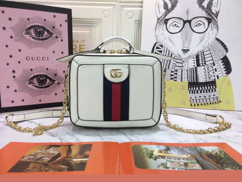 G*u*i cosmetic bags